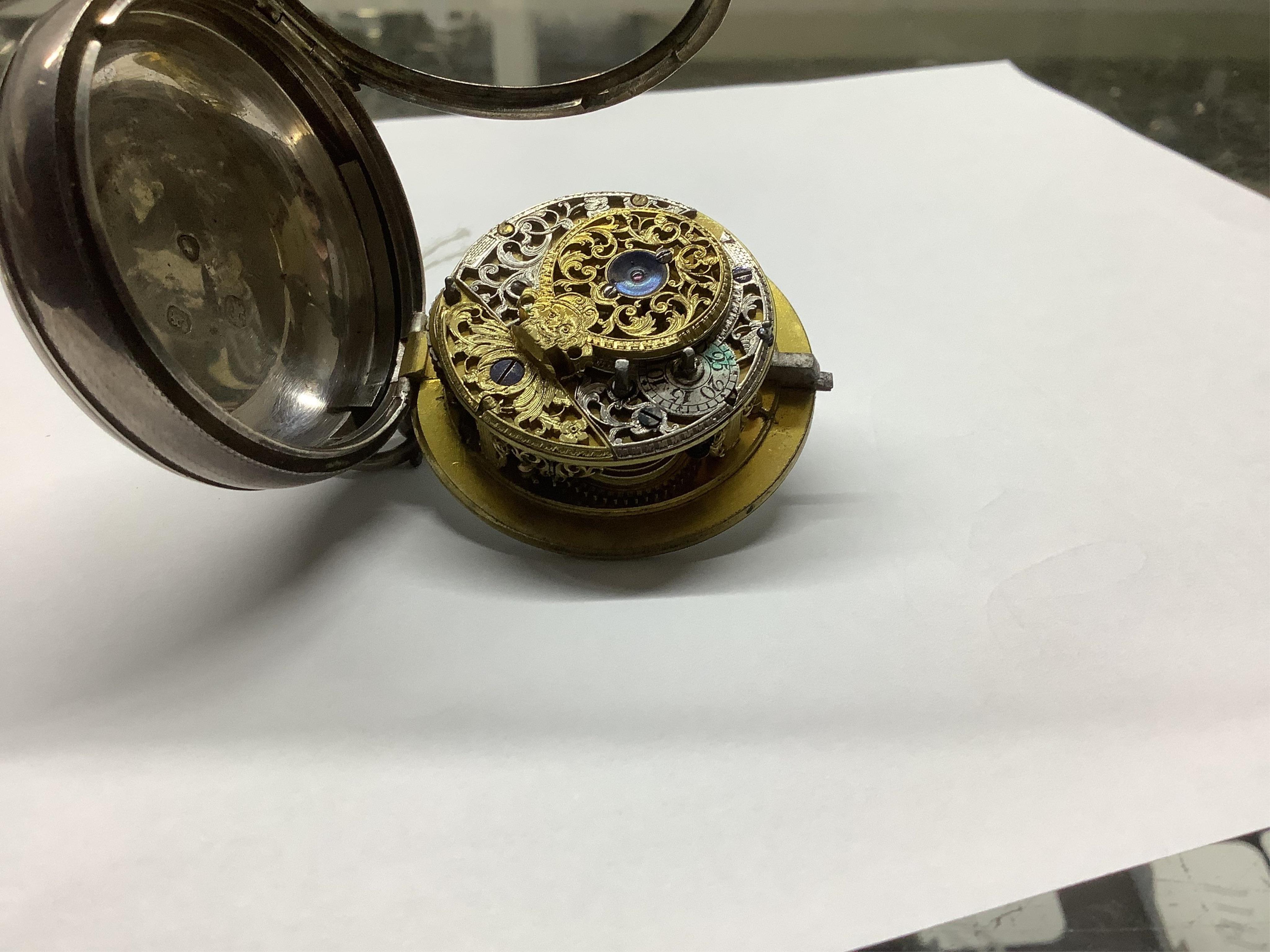 A Georgian silver open face key wind pocket watch, by Jno. Ellicott of London, lacking glass, case diameter 48mm. Condition - poor